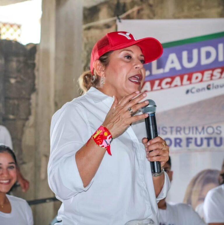 claudia con el brazalete