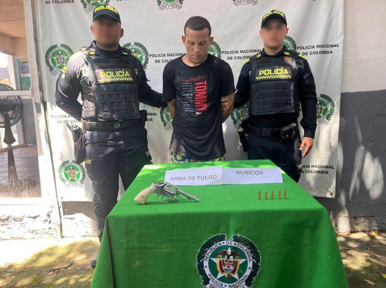 con la pistola